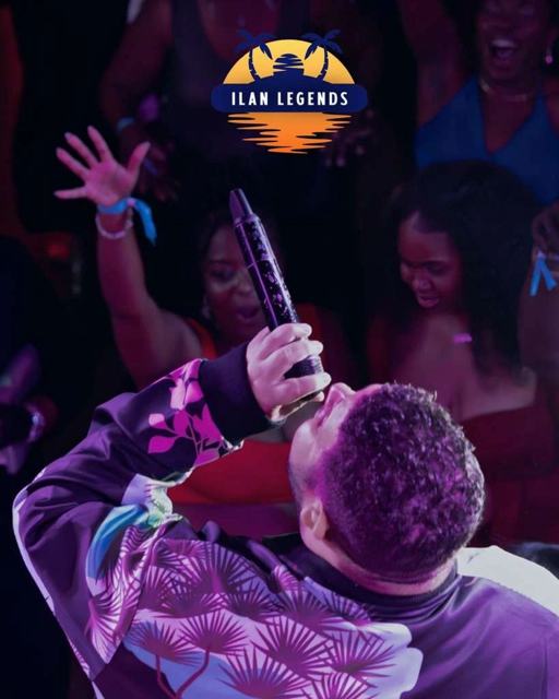A vocalist singing with the crowd