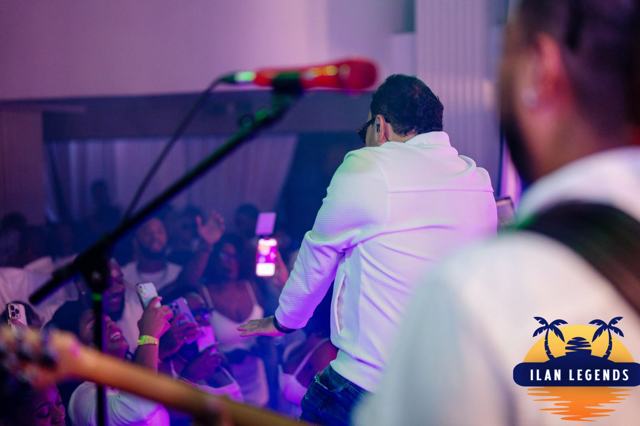 A performer and the crowd, seen from the stage
