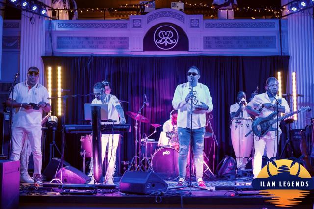 The full band on stage